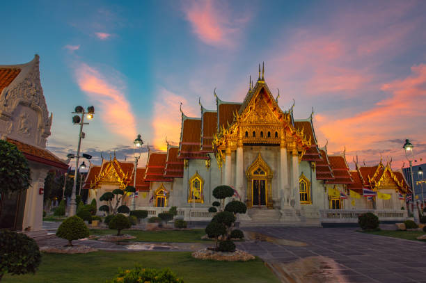 istock sunset at wat Benchamabophit in Bangkok 1150040299