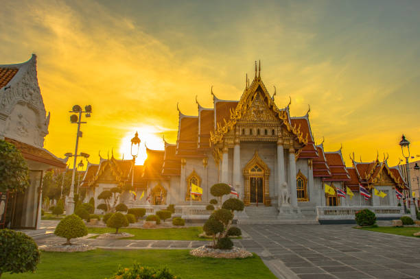 istock sunset at wat Benchamabophit in Bangkok 1150040319