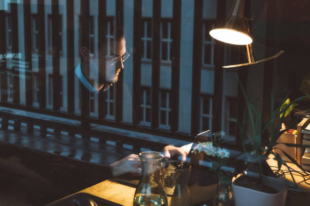 istock young businessman working late in the office at night 1150043044