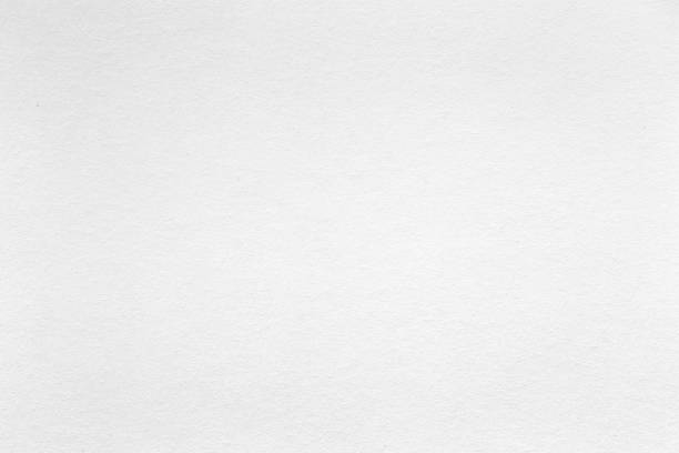 istock White bright cardboard background. White paper texture. 1150044542