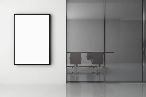 istock Empty modern meeting room with poster on the wall. Advertise board for office. Mock up, 3D render. 1150044915
