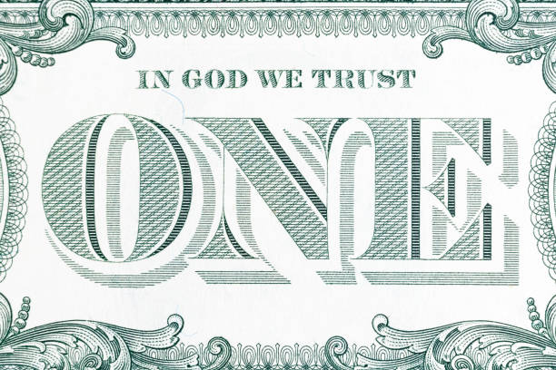 istock In God we trust - banknote one dollar close-up. 1150044967