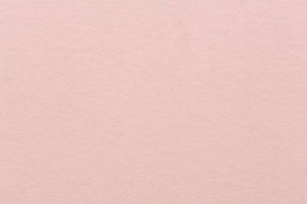 istock Light pink textured decoration paper. Bright pink background. 1150045712