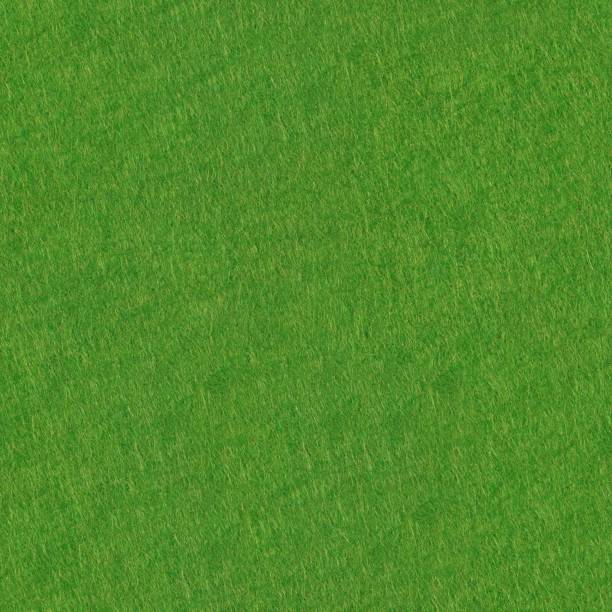 zielone tło filcowe. bezszwowa kwadratowa tekstura, gotowe płytki. - felt green velvet seamless zdjęcia i obrazy z banku zdjęć