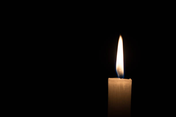 istock Candle on The Black Background 1150047682