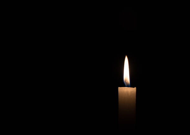 istock Candle on The Black Background 1150047718