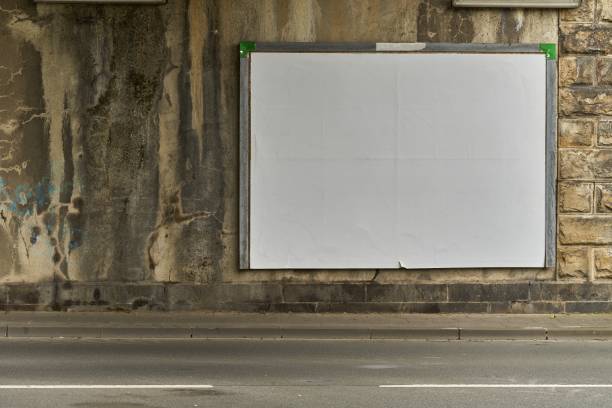 istock White blank billboard at the wall of an old railroad underpass. 1150049283