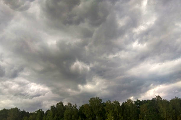 istock Storm clouds with the rain, nature background 1150053598