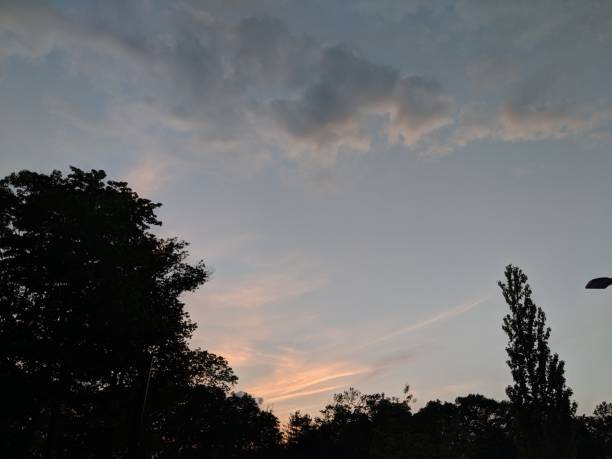 istock Orange and Blue and Purple Cloudscape 1150054125