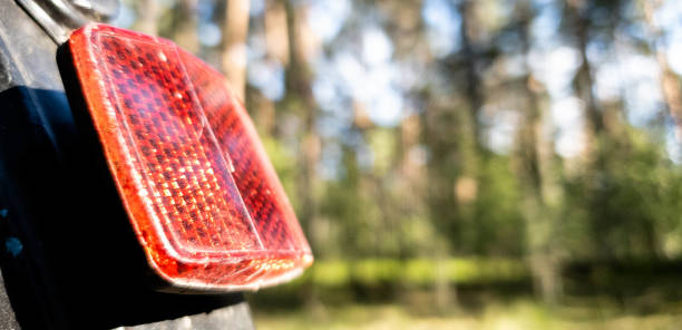 istock Rear light reflector on a red bicycle in the close up 1150057440