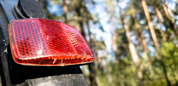 istock Rear light reflector on a red bicycle in the close up 1150057443