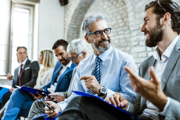 istock Happy businessmen talking while waiting for job interview. 1150057454