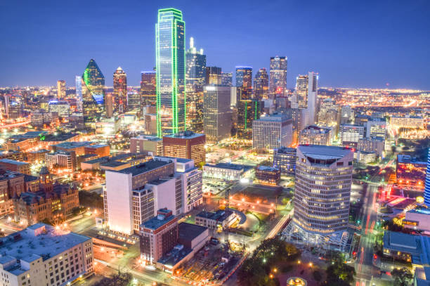 istock Skyline of Downtown Dallas at Dusk (City Lights from Above)) 1150063223