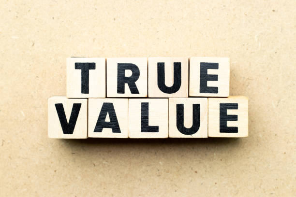 istock Letter block in word true value on wood background 1150069893