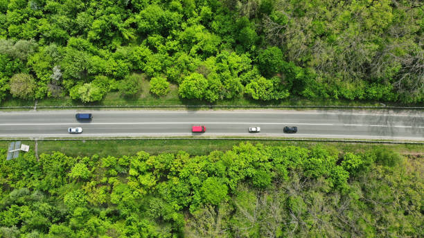 istock Aerial. Traffic on a country highway. Top view. 1150075005