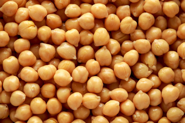 istock Fresh raw chickpeas background, texture. Healthy food. 1150078019