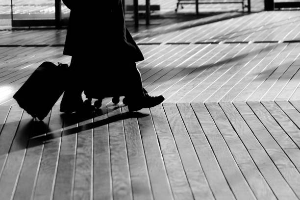 istock Shadow of people that walk the wood deck 1150078519