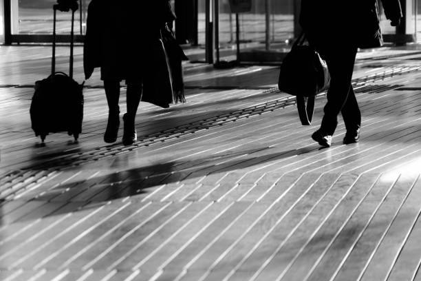istock Shadow of people that walk the wood deck 1150079028