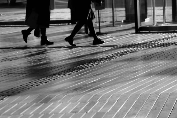 istock Shadow of people that walk the wood deck 1150079074