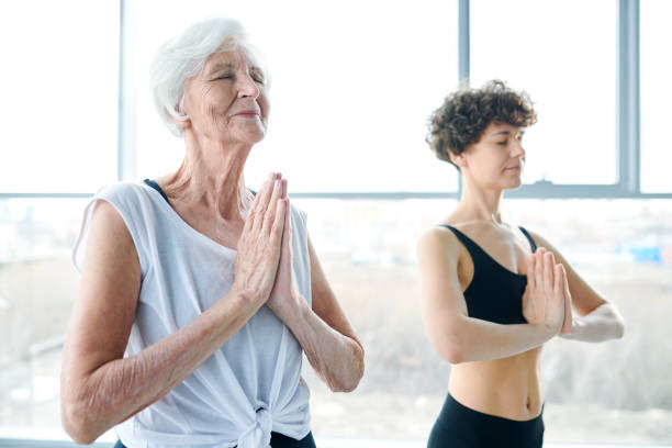 istock Exercising in yoga center 1150079262