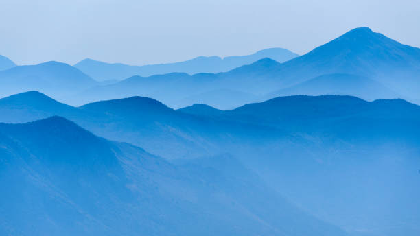 istock Blue distant mountains landscape for wallpaper 1150079860