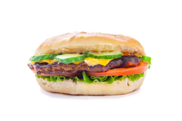 istock juicy delicious cheeseburger with a big chop, isolate, close-up 1150081426