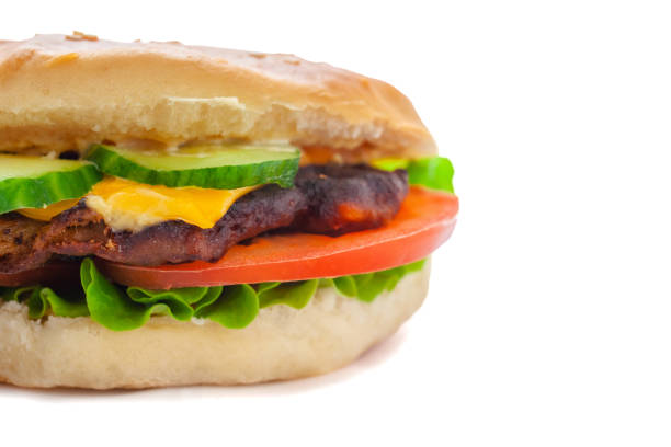 istock juicy delicious cheeseburger with a big chop, isolate, close-up, copy space 1150081431