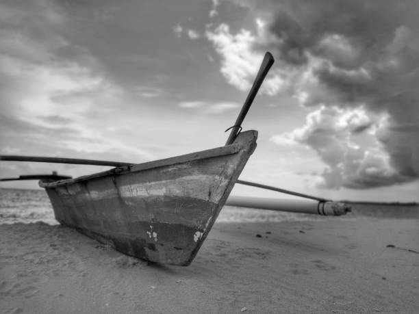 istock A traditional canoe on the beach during the low tide. 1150082422