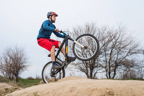istock Man on a mountain bike performs a dirty jump. Active lifestyle. 1150082808