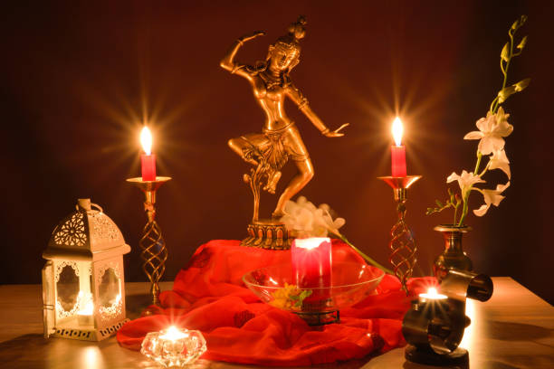 istock Indian statue on altar with romantic candles 1150083624