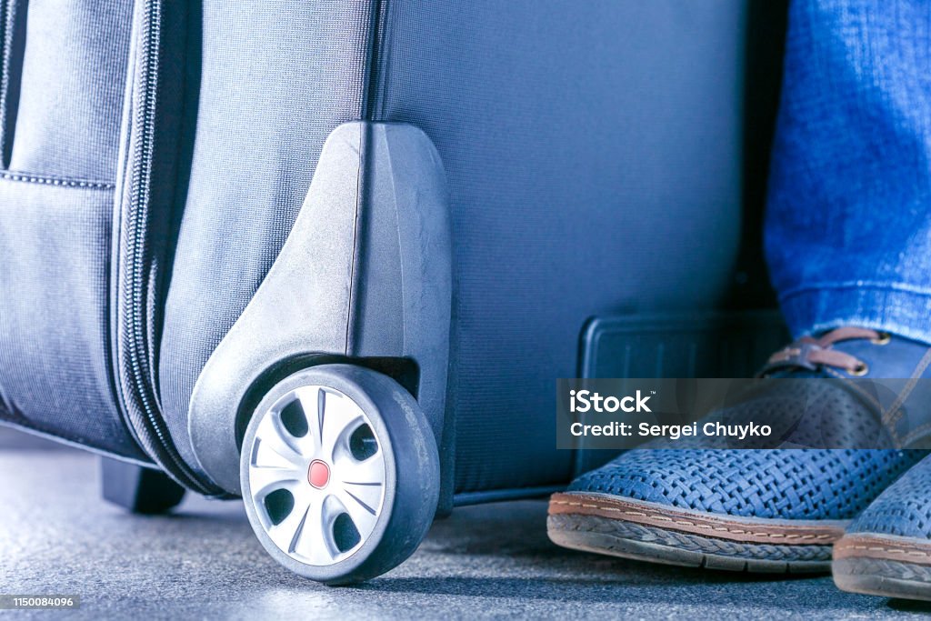 Traveller With A Suitcase. Travel concept. Business trip concept Adult Stock Photo