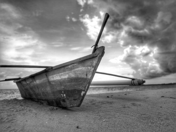istock A traditional canoe on the beach during the low tide. 1150084783