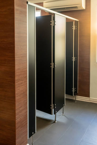 istock Clean public toilet room empty with wooden partition. restroom interior. 1150093801