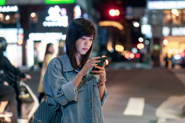 istock A young woman looking at a smartphone 1150096975