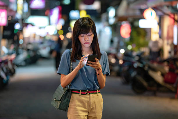 istock A young woman looking at a smartphone 1150096980