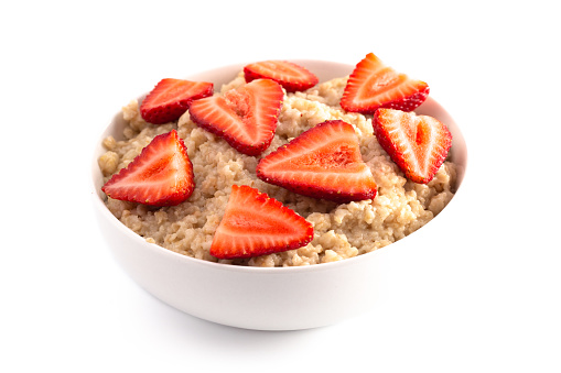 Oatmeal with Strawberries Isolated on a White Background