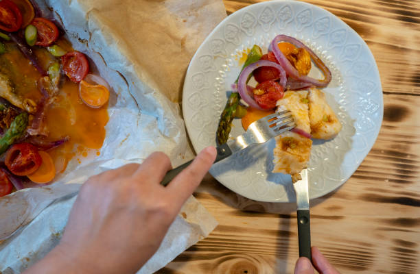 istock homemade parchment baked fish fillet 1150097298