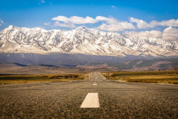 istock Road on the background of mountains 1150108117