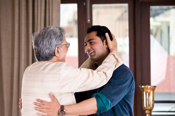 istock Senior father blessing his son at home 1150114418