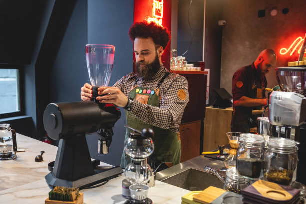 istock Coffee shop workers working and cleaning the bar 1150116825