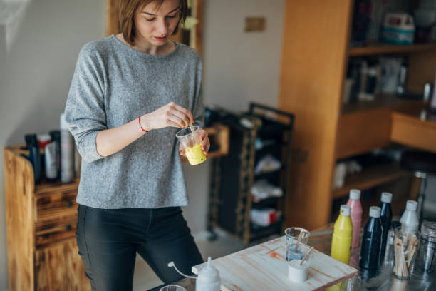 istock Young artist preparing colors for painting 1150118931