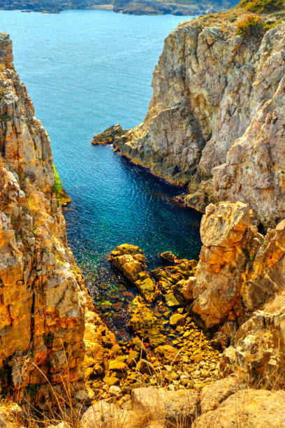 istock Landscape with rocky shore and blue sea 1150119158