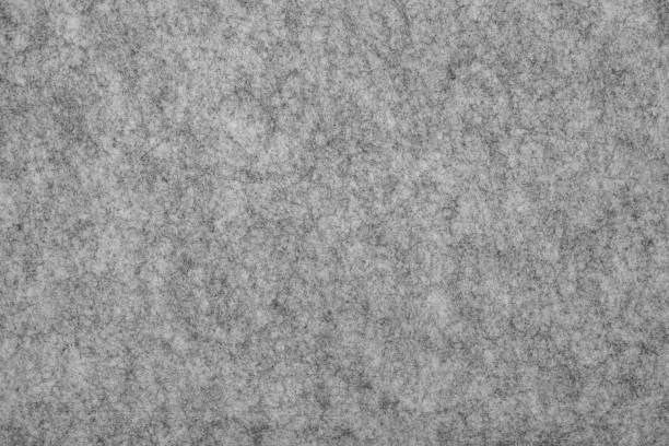 istock Felt Texture Background. Soft grey felt material. Surface of felted fabric texture abstract background. High resolution photo. 1150120594