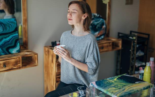 istock Talented woman enjoys in first coffee 1150121191