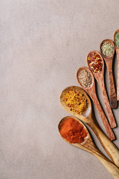 istock Variety of spices: on wooden spoons 1150121348