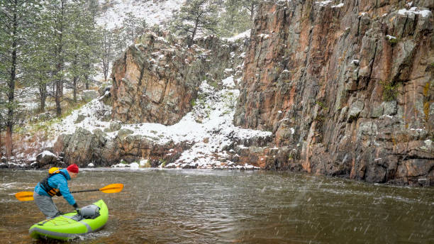 istock whitewater paddling in snowstorm 1150122264