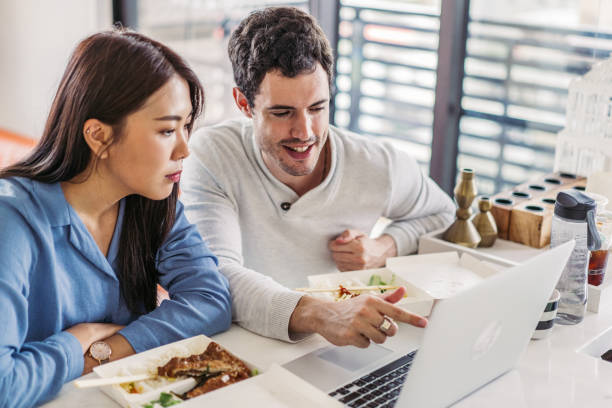 istock Friends eating together 1150122324