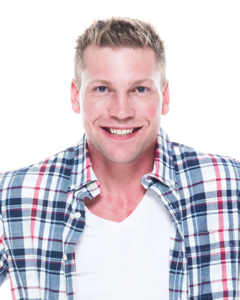 istock Handsome man in shirt and shorts with hands on hips 1150128816