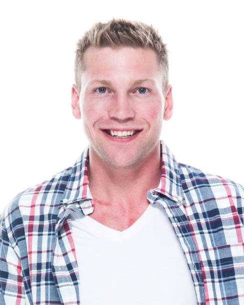 istock Handsome man in shirt and shorts with hands by side 1150128852