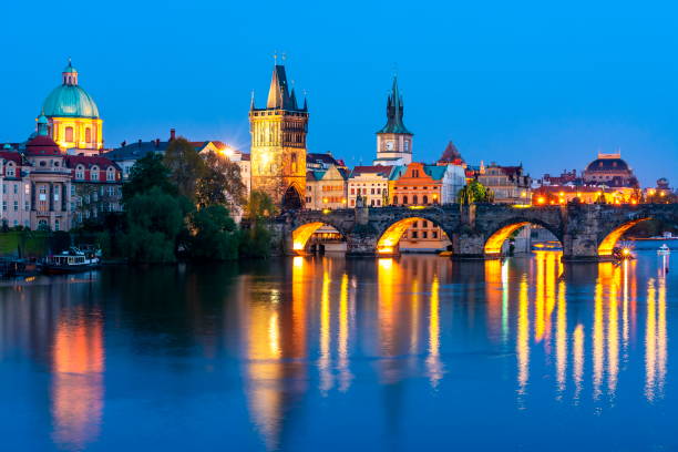 istock Prague architecture and Charles bridge over Vltava river at night, Czech Republic 1150133030